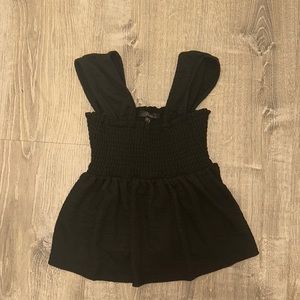 Francesca’s Sierra Smocked Babydoll Blouse in Black